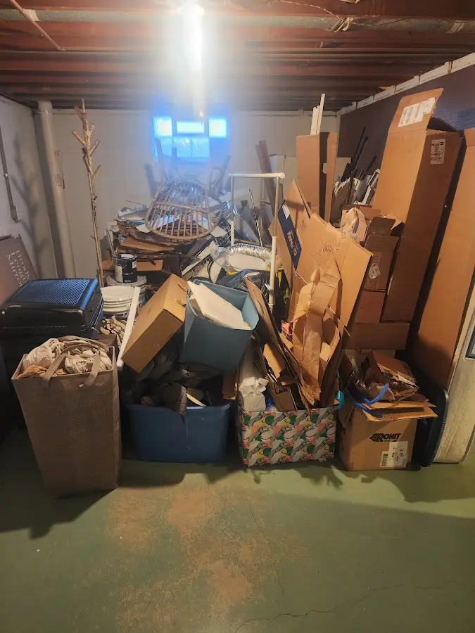 Roll-off dumpster container at job site for 2 Yard Dumpster Rental in West Carrollton